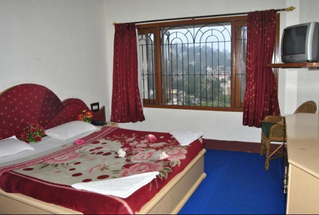 קודאיקנאל Hotel Ruby International חדר תמונה